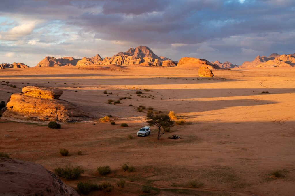 a car parked in the middle of a desert
